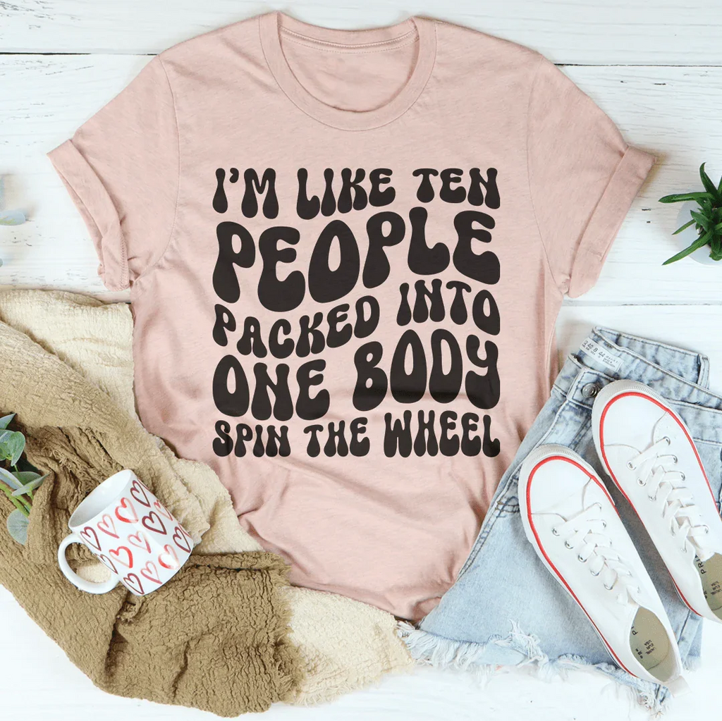 I’m Like Ten People Packed Into One Body Spin The Wheel Tee Peachy Sunday
