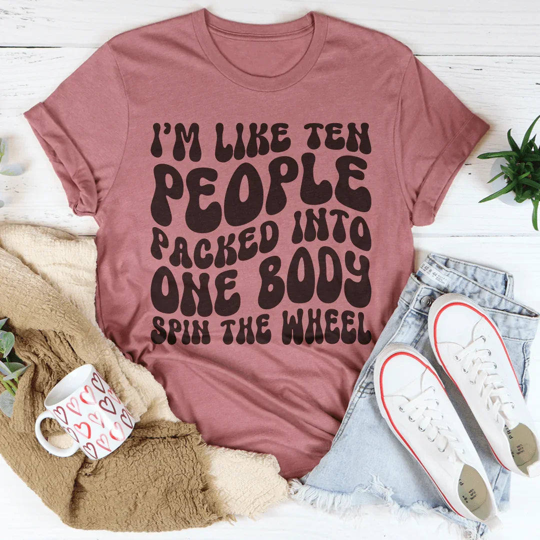 I’m Like Ten People Packed Into One Body Spin The Wheel Tee Peachy Sunday