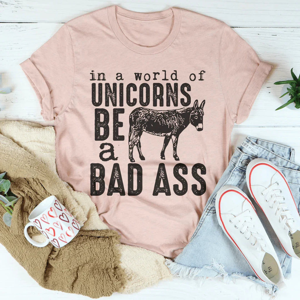 In A World Of Unicorns Be A Badass Tee Peachy Sunday