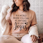 In A World Where You Can Be Anything Be Like Jesus Tee Peachy Sunday
