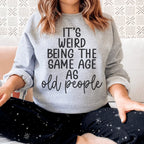 It's Weird Being The Same Age As Old People Sweatshirt Peachy Sunday