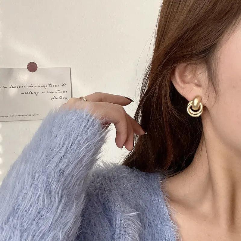 MAC064 Interlocking Circle Earrings - SJB-DIAMOND ELITES