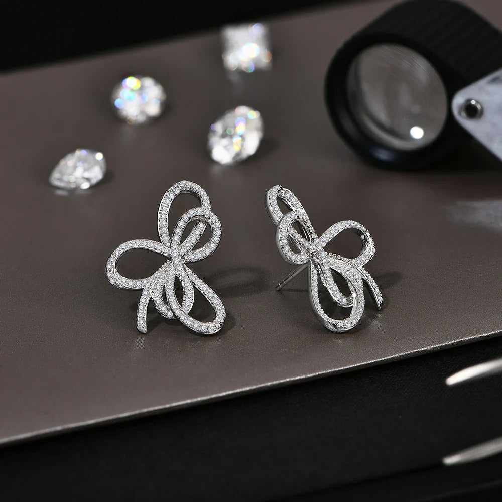 Moissanite Bow Knot Stud Earrings 925 Sterling Silver Sparkling Engagement BandsCo Straps
