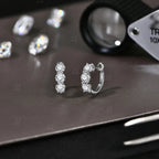 Moissanite Three-Stone Hoop Earrings 1.8 CTW Round Cut 925 Sterling Silver BandsCo Straps