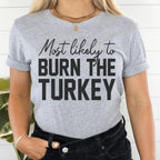 Most Likely To Burn The Turkey Thanksgiving Tee Peachy Sunday