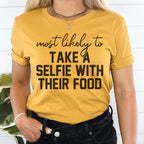 Most Likely To Take A Selfie With Their Food Thanksgiving Tee Peachy Sunday