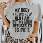 My Body Knows How Old I Am But My Mind Refuses To Believe It Tee Peachy Sunday