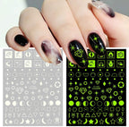 Nail Stickers Back Glue Fluorescent Light Flame Butterfly Moon Love Pattern Designs Nail Decal Decoration Tips For Beauty Salons Glow in Dark Nail Stickers Self-Adhesive Nail Art Decals Butterfly Flower Star Heart Nail Strips Glow Dark Nail Art Manicure Stevvex