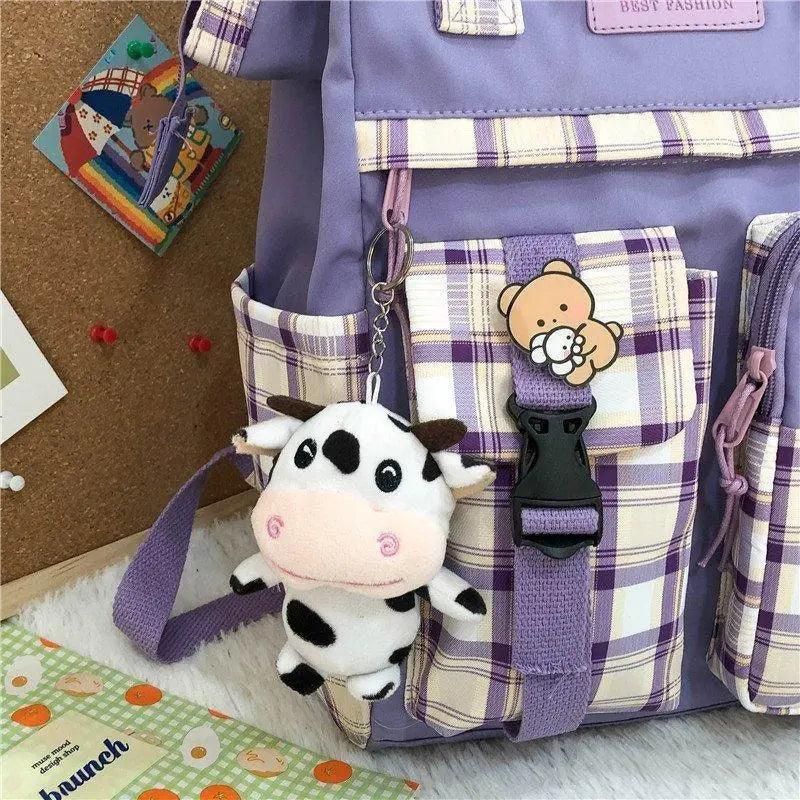 New Trendy Casual Women Purple Backpacks Fashionable Black Cow Pattern Travel Bag And School Bag for Teenager And Girls Stevvex