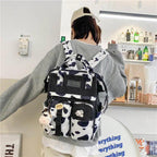 New Trendy Casual Women Purple Backpacks Fashionable Black Cow Pattern Travel Bag And School Bag for Teenager And Girls Stevvex