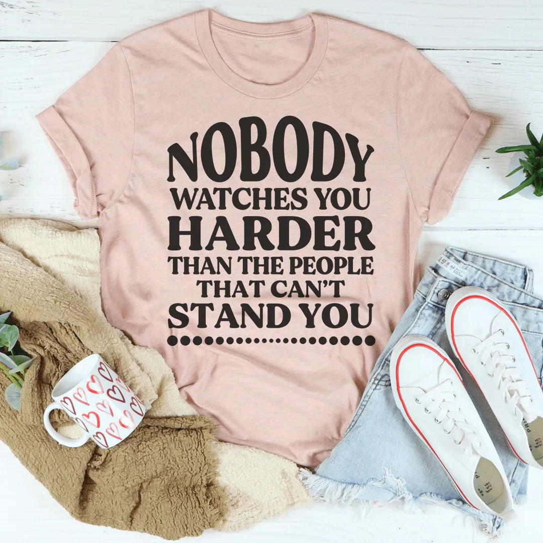 Nobody Watches You Harder Than The People That Can't Stand You Tee Peachy Sunday