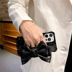Oversized Beautiful Cute Bowknot Ribbon Cute Unique Pattern Case Soft Lightweight Leather Wrist Holder Stand Soft Phone Case For iPhone 14 13 7 8 Plus X XS XR MAX 11 Pro Phone Case Stevvex