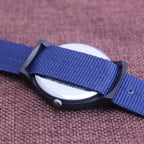 Unisex Fashion Nylon Fabric Kids Children Watch Sport Thin Students Canvas Quartz Dress Wristwatch Military Time Watch  Field Outdoor Sport Mens Wristwatch With Slip-Thru Nylon Band Stevvex