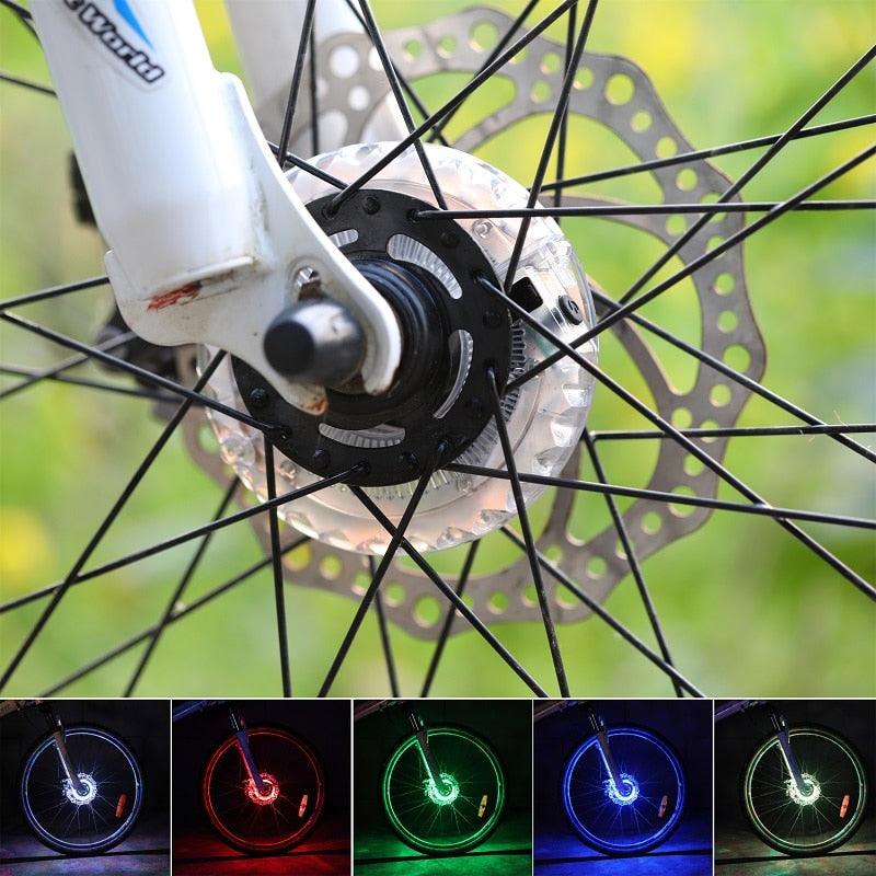Smart LED Bicycle Wheel Light Bike Front Tail Hub Spoke Lamp Rechargeable Kids Balance Bike Light Colorful Bicycle Hub Light With Optical Design Vibration Sensor USB Rechargeable Waterproof Good Bike Gift For Teenagers Stevvex