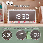 Digital Clock Table Clock Snooze Alarm Cute Silent Mirror Clock Student Desktop Mirror Surface LED Alarm Clock with USB Charger 12/24H Easy Snooze Function Adjustable Brightness Alarm Clocks for Bedroom LED Clock Electronic Clock for Children Stevvex