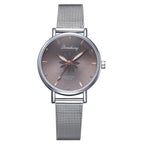 Women's Stylish Elegant Watch With Braided Steel Bracelet With Shiny Background Unique Design Perfect Gif
