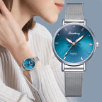 Women's Stylish Elegant Watch With Braided Steel Bracelet With Shiny Background Unique Design Perfect Gif