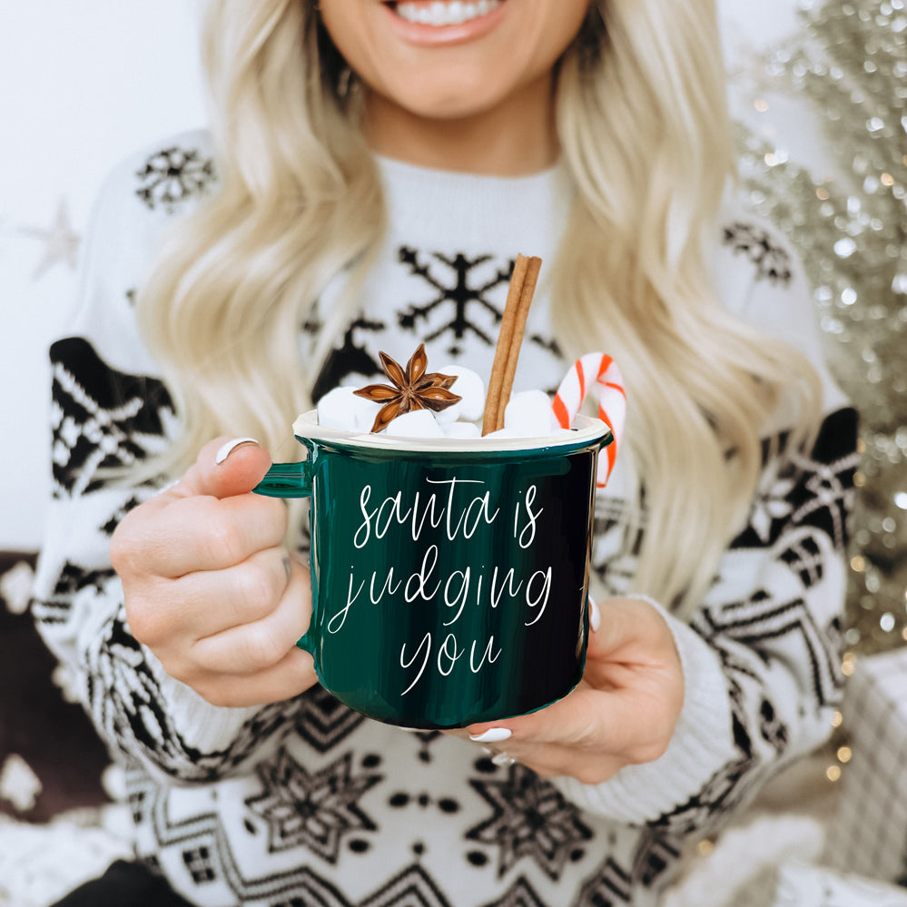 Santa Is Judging Mug 14.5oz Ceramic Campfire Style Holiday Coffee Mug Red Or Green Double Sided BandsCo Straps