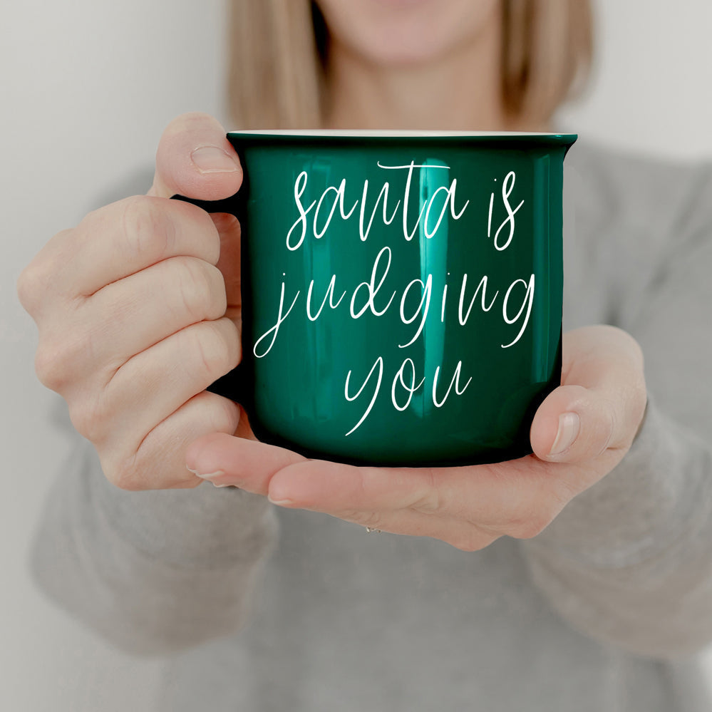 Santa Is Judging Mug 14.5oz Ceramic Campfire Style Holiday Coffee Mug Red Or Green Double Sided BandsCo Straps