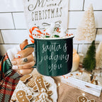 Santa Is Judging Mug 14.5oz Ceramic Campfire Style Holiday Coffee Mug Red Or Green Double Sided BandsCo Straps