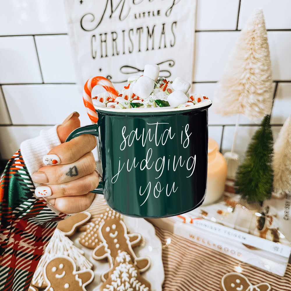 Santa Is Judging Mug 14.5oz Ceramic Campfire Style Holiday Coffee Mug Red Or Green Double Sided BandsCo Straps