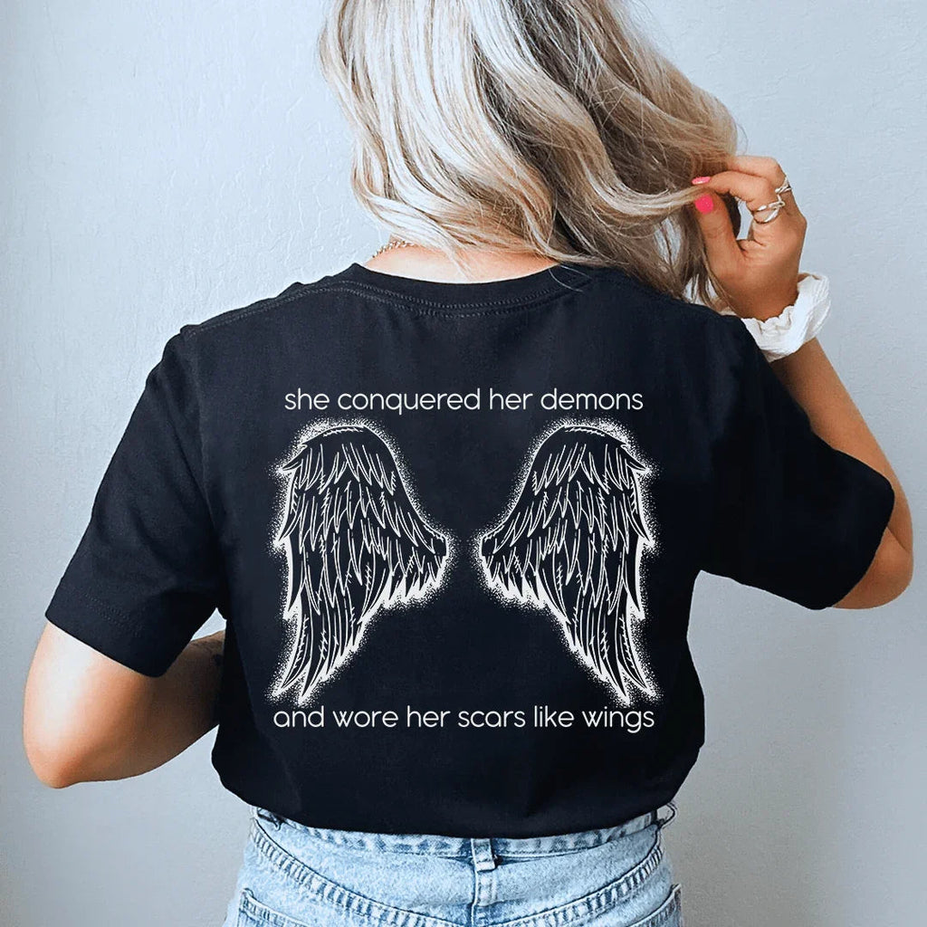 She Conquered Her Demons And Wore Her Scars Like Wings Tee Peachy Sunday