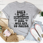 She's a big hearted girl with hips to match Tee