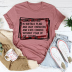 She's Clothed In Buffalo Plaid And Ugly Sweaters Tee