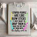Stupid People Are Like Glowsticks Sweatshirt Peachy Sunday