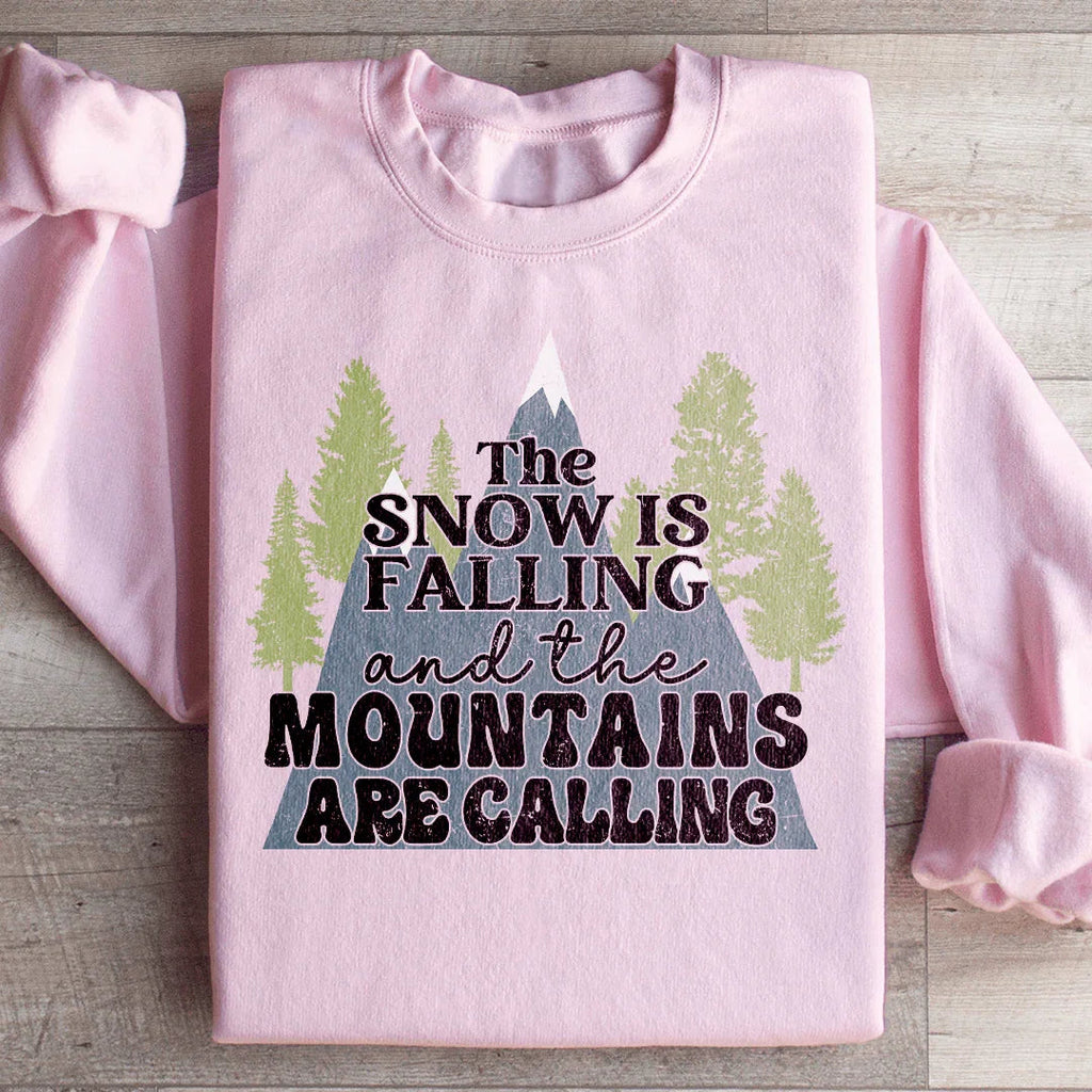 The Snow Is Falling And The Mountains Are Calling Sweatshirt Peachy Sunday