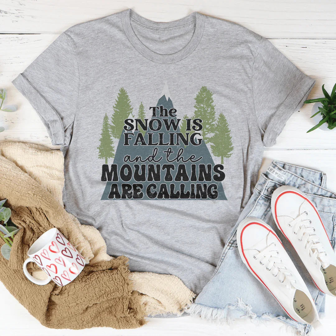 The Snow Is Falling And The Mountains Are Calling Tee Peachy Sunday