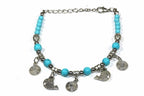 Turquoise Beaded Fish Charm Bracelet With Spiral Charms